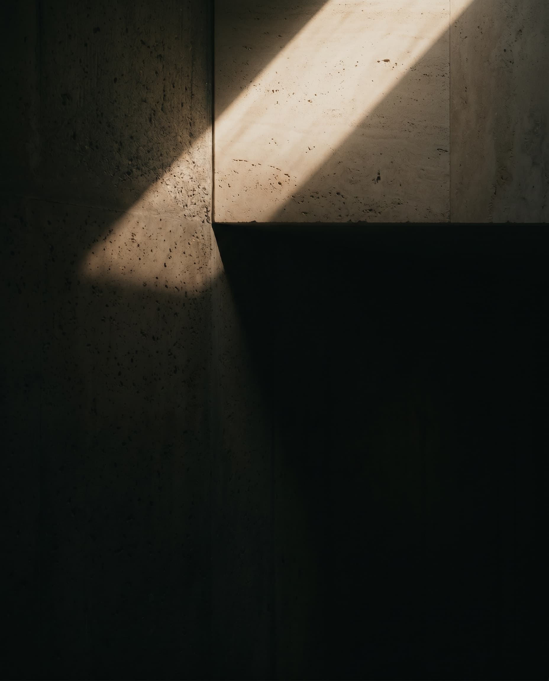 Daylight across a concrete interior